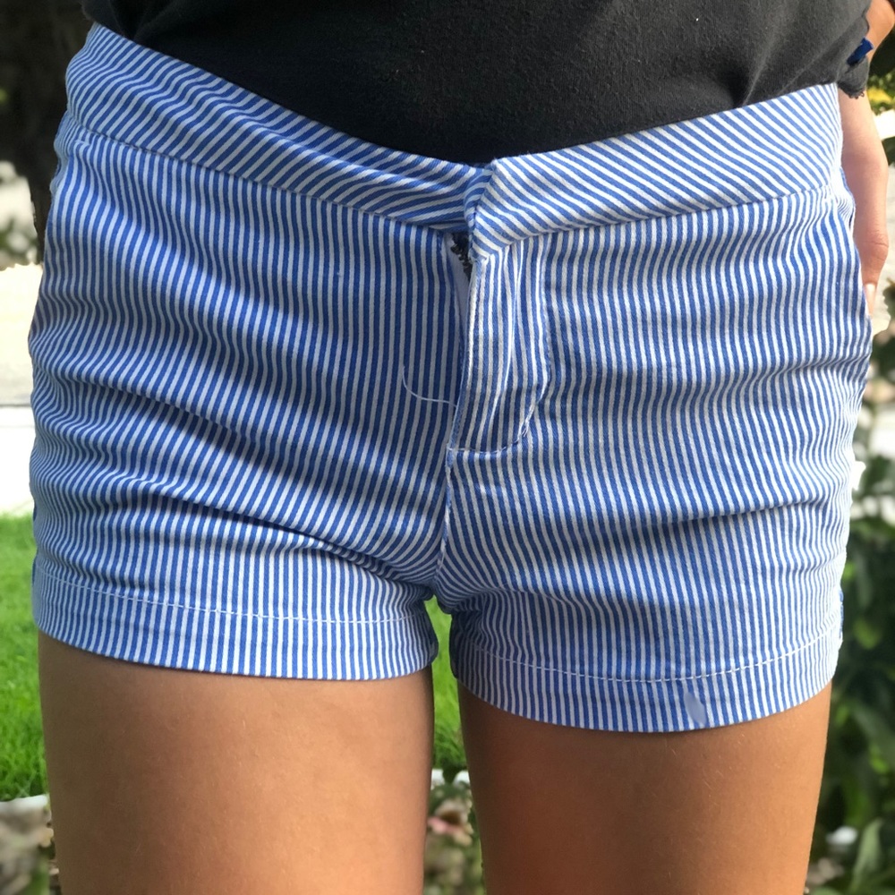 striped shorts.